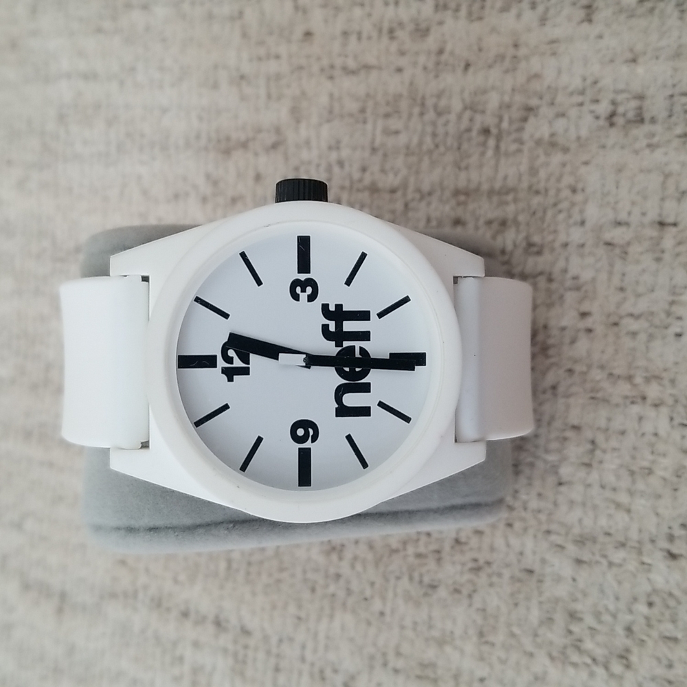 All white rubber Neff watch with black accents.  Need battery replacement.